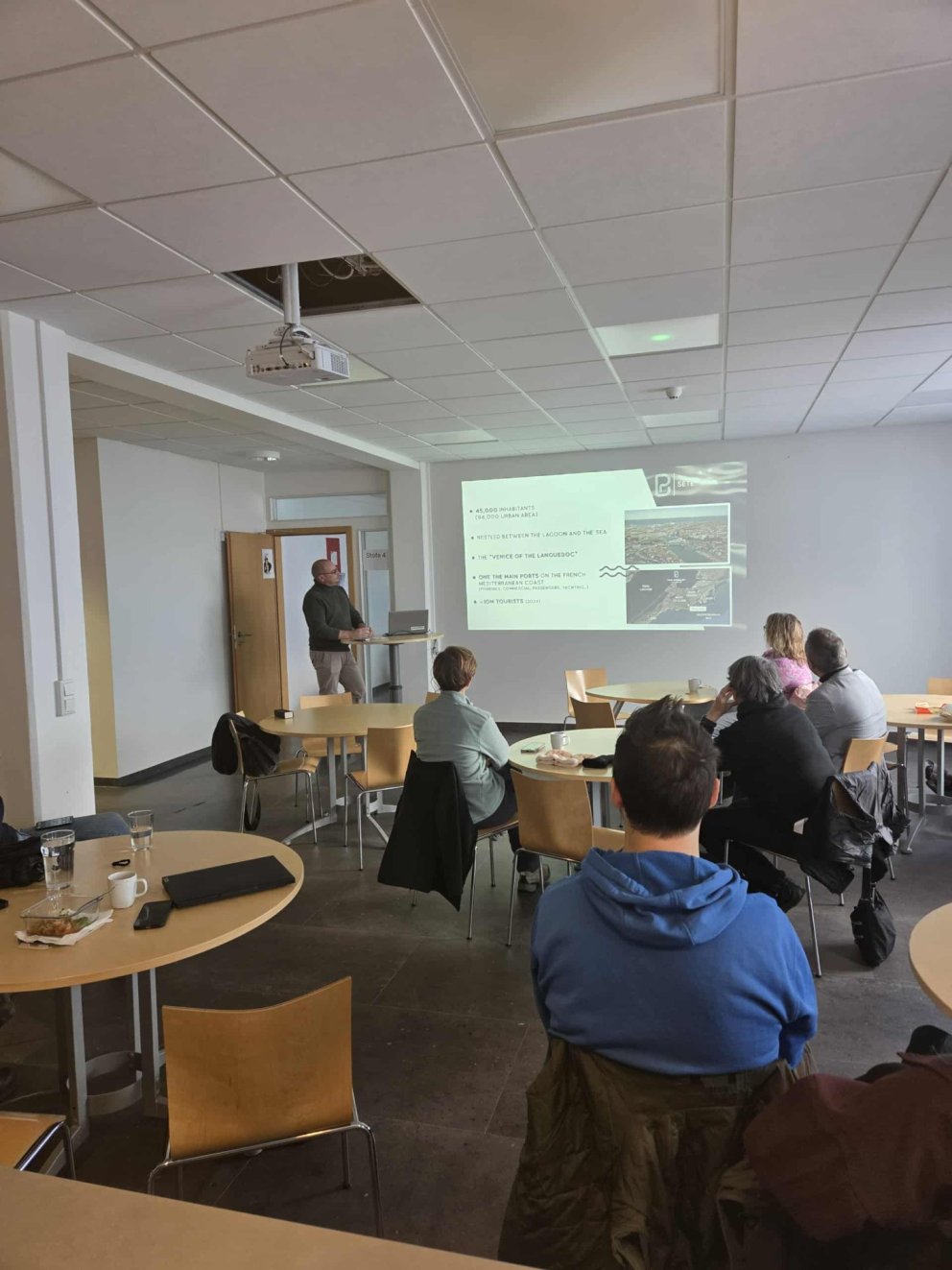 Guests listen with interest during the weekly lunch lecture